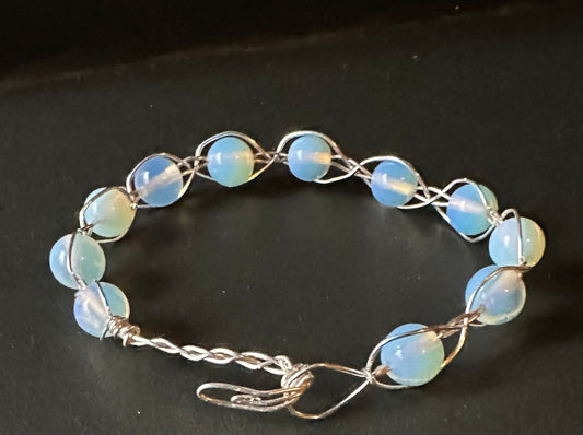 Moonstone and silver braided bracelet